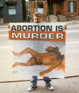Bill Whatcott in front of Scott's abortuary Sept. 1996