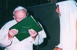 John Paul II kissing the Koran.