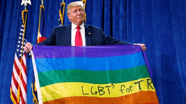 Donald Trump protecting his political career, by strutting around with the «gay» flag.